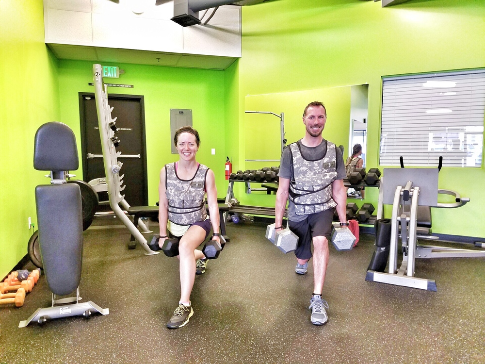 After our workout with the weighted vests, I asked our trainer to take a photo - I should have known better, because of course she made us hold an isometric lunge for the occasion (Aaron is holding 140lbs!!).  
