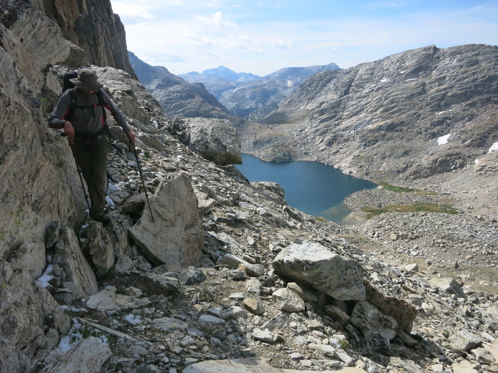 Hugging the wall towards Douglas Peak Pass.  Lake 10787 in the background.  