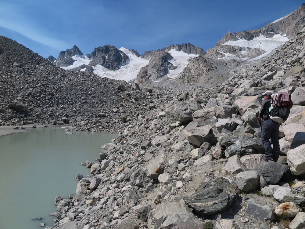Earlier in the trip, hiking through glacial moraines after West Sentinel Pass. 